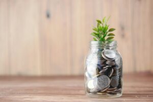 when to hire a fractional cfo business owner reviewing financial data and growth decisions