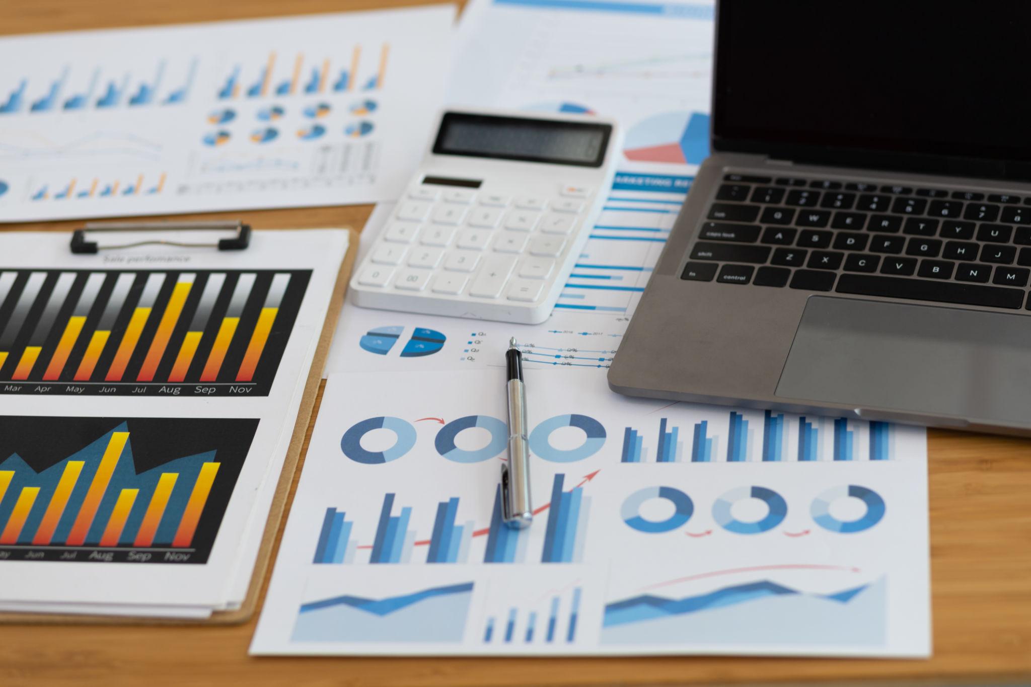 financial reports and business analytics illustrating revenue growth and cash flow management challenges