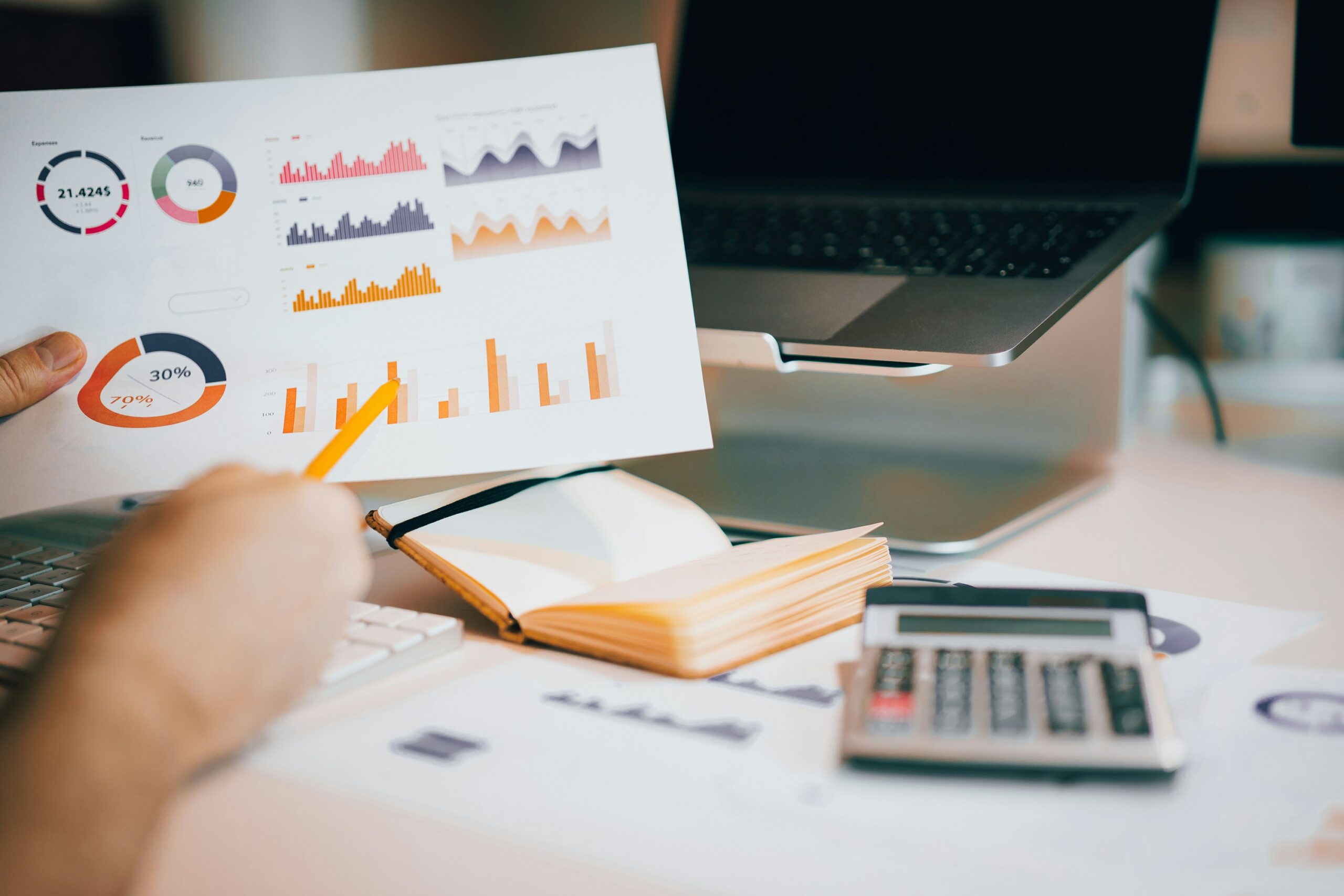 Financial reports, KPI dashboards, and business performance charts illustrating signs that a growing company has outgrown basic accounting support.