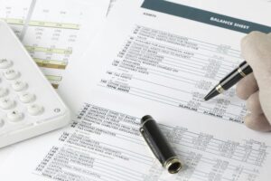 Financial statements, profitability analysis, and business performance metrics used to measure the ROI of a fractional CFO.
