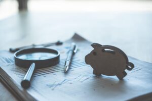 Financial reports, business performance charts, and cash flow analysis tools used to evaluate when a growing company should hire a fractional CFO.